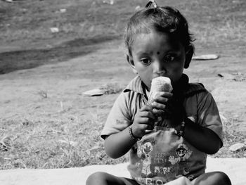 Close-up of hand holding ice cream