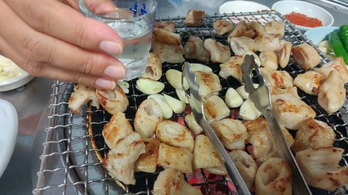 Close-up of person preparing food