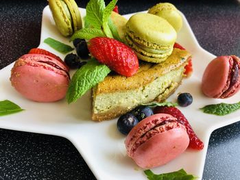 High angle view of fruits in plate on table