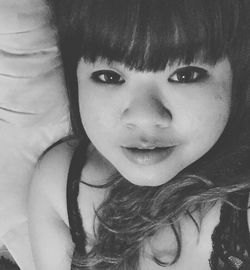 Close-up portrait of young woman