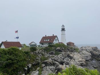 Maine lighthouse amidst overcast sky