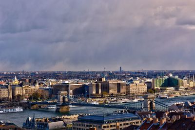 Chain bridge view from fishermans bastion high angle view of city buildings against cloudy sky