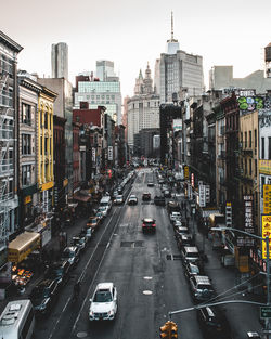 High angle view of traffic on city street and buildings