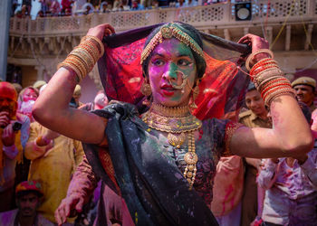 Transgender dancing during the holi celebration at nandgaon temple