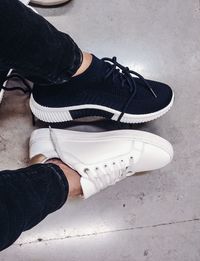 Low section of man standing on floor