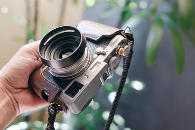 Close-up of a hand holding digital camera