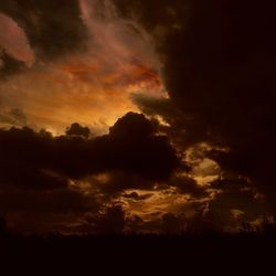 Low angle view of cloudy sky at sunset