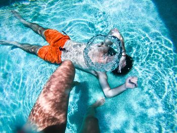 High angle view of man swimming in pool