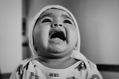 Close-up of baby girl crying