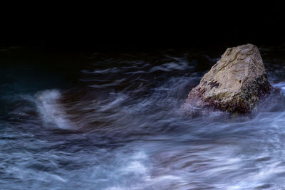 Scenic view of rock formation in sea