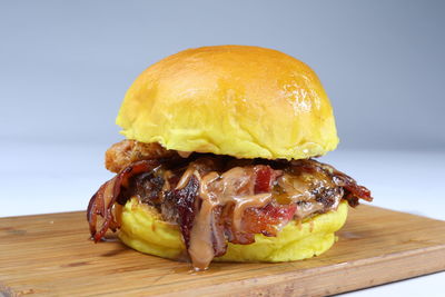 Close-up of burger on cutting board