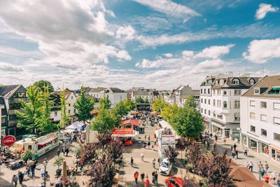 High angle view of street amidst buildings in city