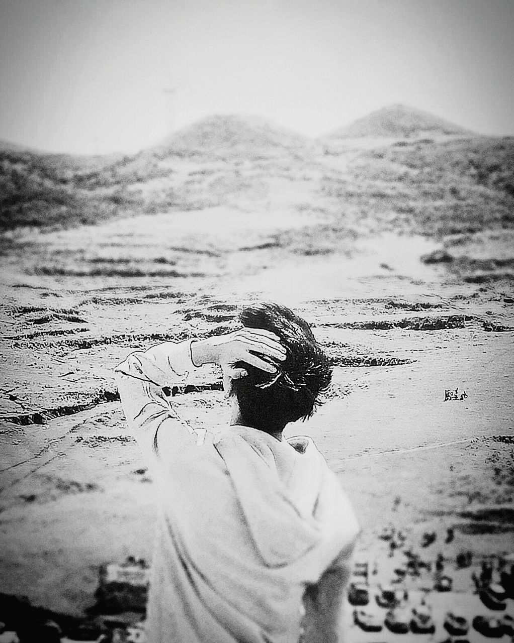 sand, real people, one person, beach, lifestyles, day, leisure activity, outdoors, nature, headshot, mountain, women, water, men, desert, close-up, young adult, sky, adult, people