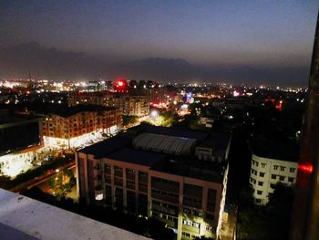 Illuminated cityscape at night