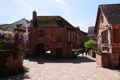 View of buildings in city against sky