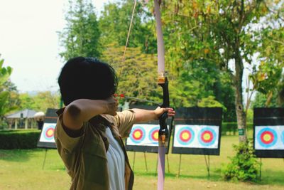 Girl playing arrow