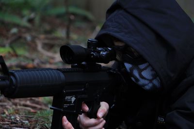 Close-up of man photographing