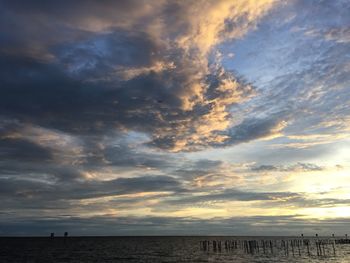 Scenic view of dramatic sky over sea