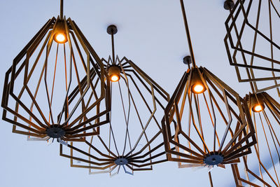 Low angle view of illuminated light against sky