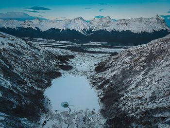 Scenic view of snowcapped mountains during winter