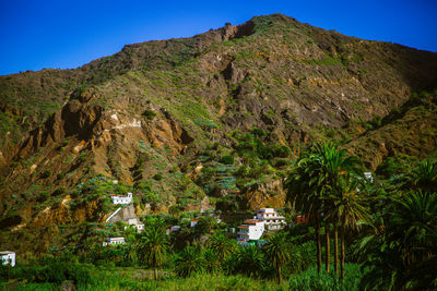 Scenic view of mountains against clear sky