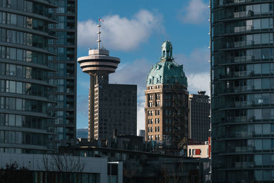 Low angle view of skyscrapers in city