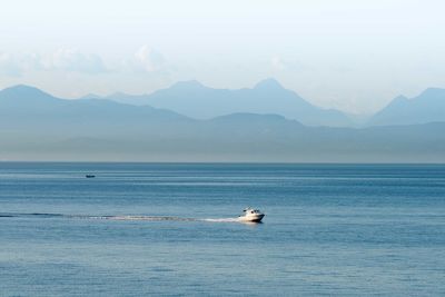 Scenic view of sea against mountain