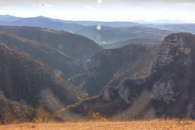 Scenic view of mountains against sky