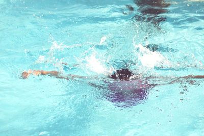 High angle view of person swimming in pool