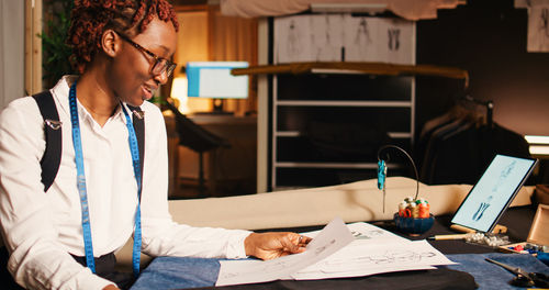 Side view of businessman working at office