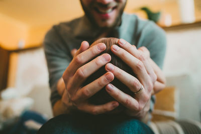 Close-up of man hand at home