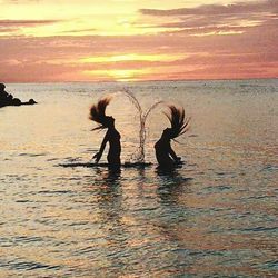 Scenic view of sea at sunset