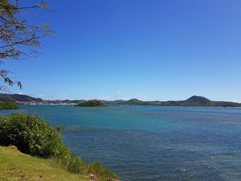 View of sea against blue sky