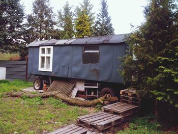 Old built structure on grassy field