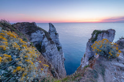 Scenic view of sea against sky during sunset