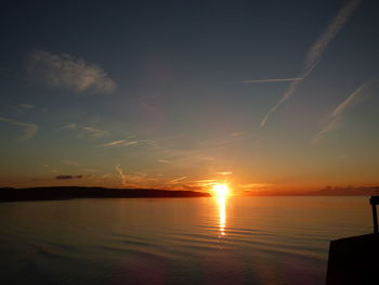 Scenic view of sunset over river