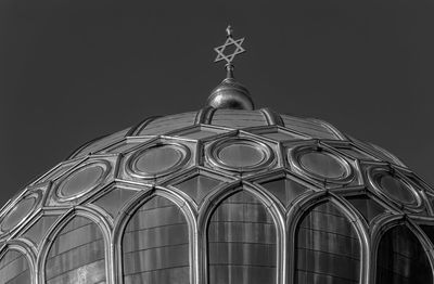 Low angle view of building against sky at night