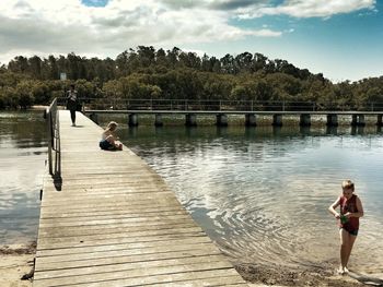 Boy standing in water