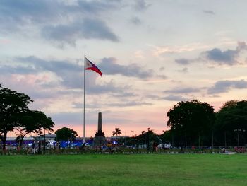 Scenic view of beach against sky during sunset