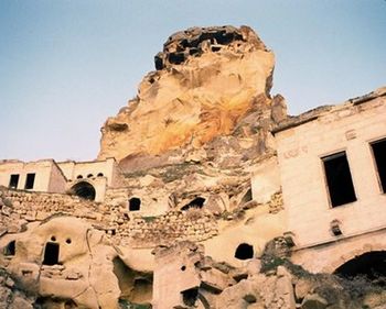 Low angle view of old ruins against clear sky