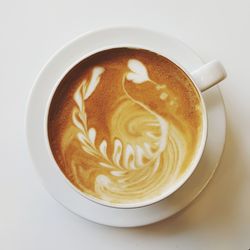 High angle view of cappuccino on table