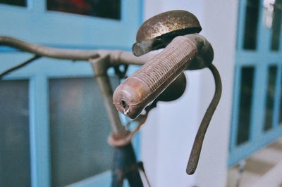 Close-up of rusty metal against wall