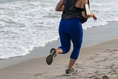 Low section of man on beach