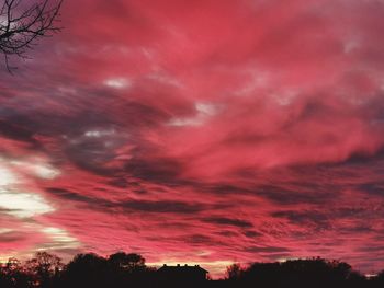 Low angle view of dramatic sky during sunset