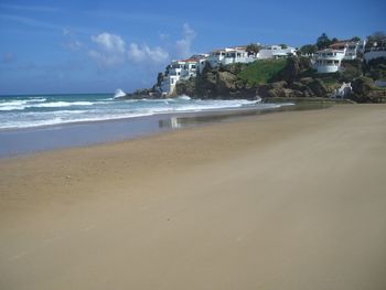 Scenic view of beach against sky