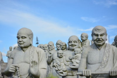 Statue of buddha against sky