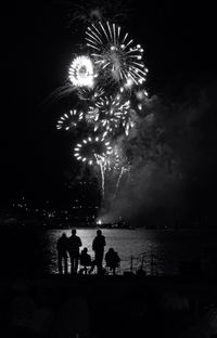 Firework display at night