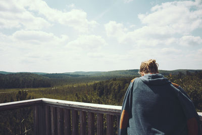 Silhouette of woman standing on landscape