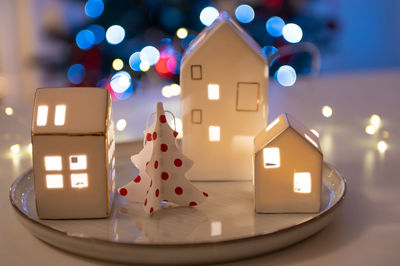 Close-up of illuminated christmas decoration on table