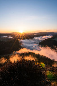 Scenic view of landscape against sky during sunset